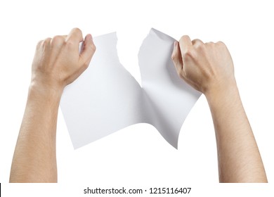 Hands tearing a sheet of white paper in half, isolated on white background - Shutterstock ID 1215116407