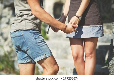 Hands Of Teen Couple