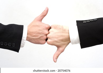 hands with thumbs up and down