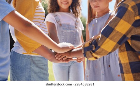 Hands together, support and children outdoor, solidarity and trust with motivation, games or growth. Closeup, kids or youth group with gesture for teamwork, commitment or fun with development or goal - Powered by Shutterstock