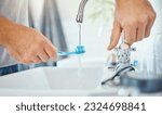 Hands, toothbrush and person at tap for water, dental hygiene and gum care at home. Closeup, brushing teeth and rinse oral product for fresh grooming, morning routine and cleaning at bathroom sink