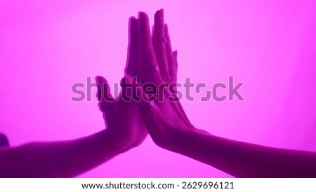 Hands Touching Visually Enhanced Vibrant Pink Glow