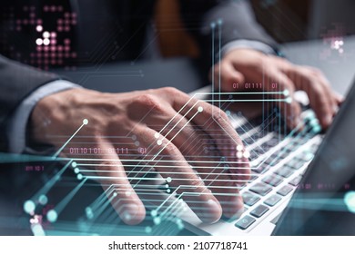 Hands typing the keyboard to create innovative software to change the world and provide a completely new service. Close up shot. Hologram tech graphs. Concept of Dev team. Formal wear.