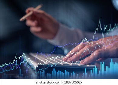 Hands typing the keyboard to research stock market to proceed right investment solutions. Internet trading and wealth management concept. Formal wear. Hologram Forex chart over close up shot.