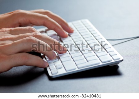 Hands typing on a keyboard/ Typing on the keyboard