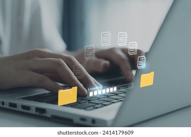 Hands typing on keyboard computer laptop for send document on internet. Data migration, Transfer file between folder, Backup data, Exchange file, DMS. Virtual document loading=