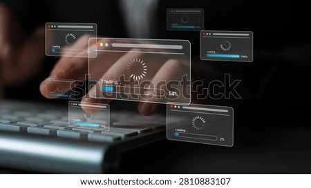 Hands Typing on Keyboard with Progress Loading Bars Displayed on Screen, Symbolizing Data Processing and Digital Technology Gluon.