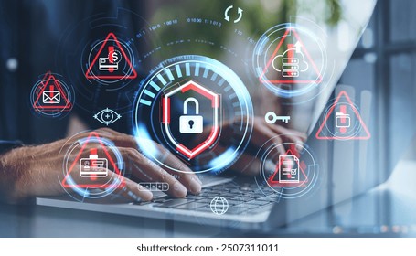 Hands typing on a laptop with digital lock icons and threat indicators overlay. Futuristic style on a blurred background. Cybersecurity concept