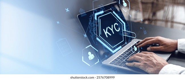 Hands typing on a laptop with a glowing KYC icon and security-related graphics on a modern blurred background. Concept of identity verification