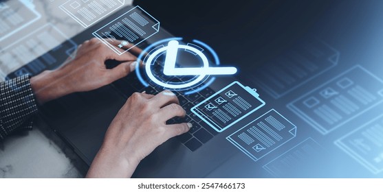 Hands typing on a laptop with holographic icons of documents and a clock on a blurred background, representing digital task management