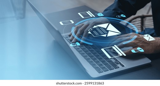 Hands typing on laptop with holographic document management icons, including email and folder symbols, representing an online business data system concept - Powered by Shutterstock - Get 15% off with code: PIKWIZARD15