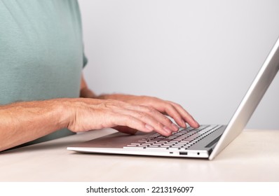 Hands Typing On Laptop Keyboard, Pc Closeup. Information Input Concept. High Quality Photo