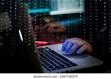 Hands typing on a laptop keyboard with a digital code overlay. Technology and coding theme. Laptop and code, hands on keyboard, digital environment.