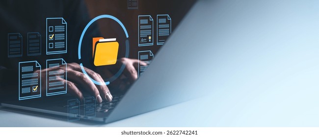 Hands typing on laptop keyboard with digital folder and file icons overlay, modern flat style, on dark gradient background, concept of data management - Powered by Shutterstock - Get 15% off with code: PIKWIZARD15