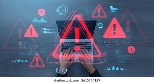 Hands typing on laptop surrounded by red digital warning symbols and data graphics, on a creative blue-toned background, concept of cybersecurity threats