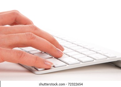  Hands Typing On The Remote Wireless Computer Keyboard In An Office At A Workplace Isolated On A White Background