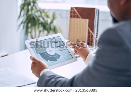 Hands typing, tablet and charts in office for customer expansion, sales analysis and statistics. Man, touchscreen and graph for big data analytics, client base or cloud computing with dashboard ux Foto stock © 