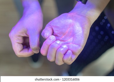 Hands Under Black UV Light To Detect Glow In The Dark Germs Around Nails And Fingerprint As Visual Tool For Teaching Proper Handwashing, Aseptic Techniques, And General Infection Control