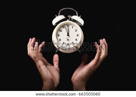 hands under  the clock