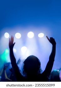 Hands up. Nightlife and disco concept. People dancing in club party. Selective Focus - Shutterstock ID 2355515099