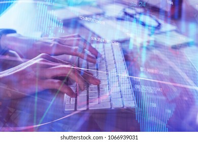 Hands using keybaord with forex chart placed on office desk with other items. Accounting, finance and computer concept. Double exposure  - Powered by Shutterstock - Get 15% off with code: PIKWIZARD15