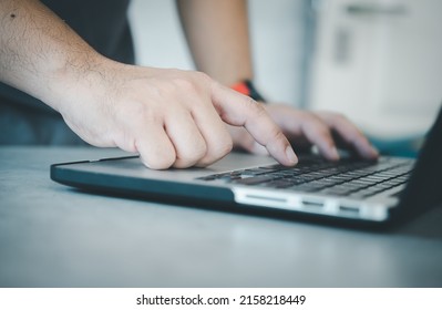 Hands using laptop, The concept of working,looking for information,browsing internet and chatting