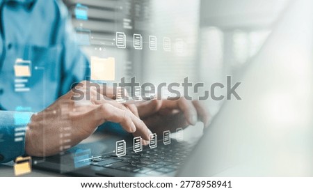 Hands using laptop with digital file icons, representing data export, cloud storage, file transfer, account privacy, secure access and document management technology.