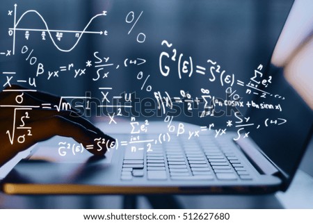 Hands using laptop with mathematical formulas. Online education concept