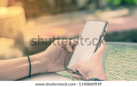 Hands using smart phone for online shopping, online payment, internet banking, chat
