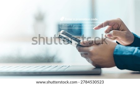 Hands using smartphone to enter a promotion code on virtual checkout interface, showing online shopping, discount, coupon, and digital ecommerce concept.