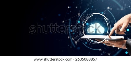 Hands using tablet with cloud upload icon, glowing digital network, blue futuristic background. Concept of cloud computing and data technology