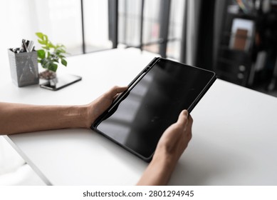 Hands using vertical tablet for online communication and digital technology lifestyle