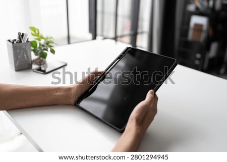 Hands using vertical tablet for online communication and digital technology lifestyle