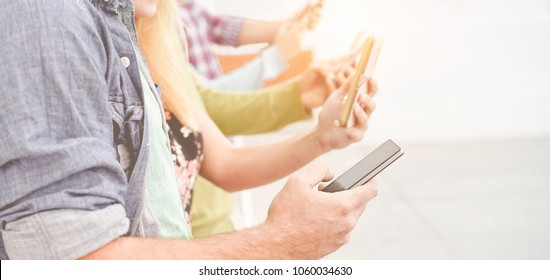 Hands View Of People Using Smartphones Outdoor - Young Friends Having Fun With Technology Trends - Youth, Tech, Millennials Generation And Lifestyle Concept - Focus On First Man Hand Mobile Phone