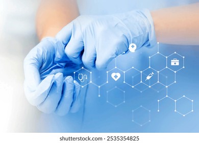 Hands wearing blue medical gloves, symbolizing healthcare, safety, and hygiene. Medical icons overlay, emphasizing healthcare and medical themes. Medical data overlay technology. - Powered by Shutterstock