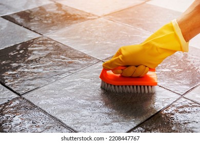 Hands Wearing Yellow Rubber Gloves Using Stock Photo 2208447767 ...