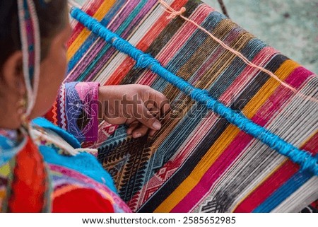 The hands of a weaver hold generations of skill, patience, and creativity, turning simple strands into works of art. Each weave is a journey, each knot a memory.  Chinchero Cusco Peru.