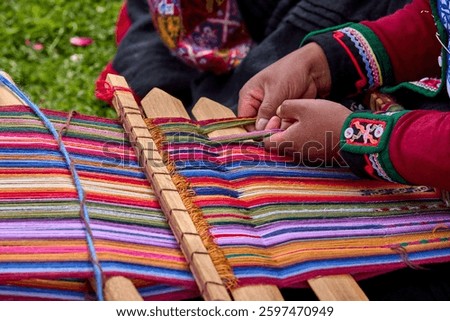 The hands of a weaver hold generations of skill, patience, and creativity, turning simple strands into works of art. Each weave is a journey, each knot a memory.  Chinchero Cusco Peru.