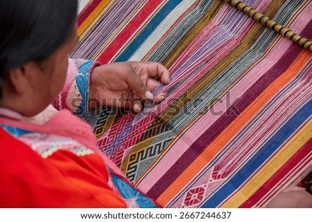 The hands of a weaver hold generations of skill, patience, and creativity, turning simple strands into works of art. Each weave is a journey, each knot a memory.  Chinchero Cusco Peru.