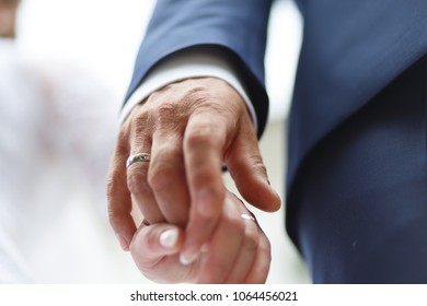 hands with wedding ring
