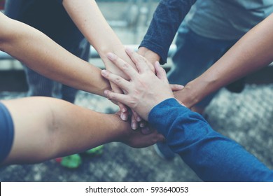 Hands were a collaboration concept of teamwork. Business people. - Shutterstock ID 593640053
