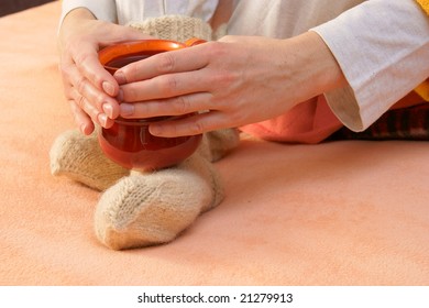 Hands with winter cup