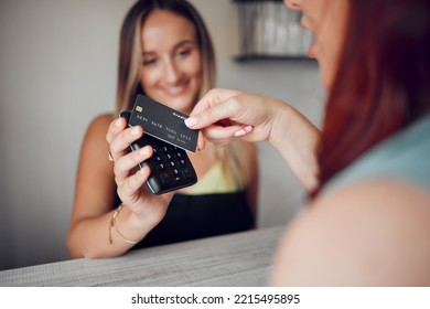 Hands, Woman And Credit Card Tap To Pay On Electronic Machine For Wireless Transaction At Cafe. Hand Of Female In Contactless Payment Tapping On Scanner For Purchase At A Coffee Shop Or Restaurant