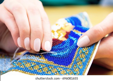 Hands Of Woman / Female / Girl Bead Embroidery Ornament Towel On Wooden Background