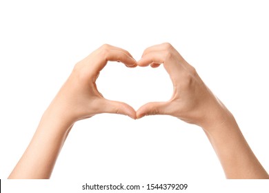 Hands Of Woman Making Heart Shape On White Background