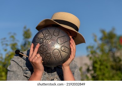 Hands Of Woman Musician Playing Steel Tongue Drum,music And Instrument.