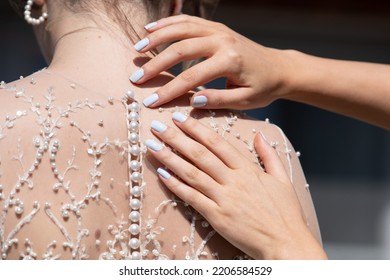 Hands Of A Woman On A Bride Drees