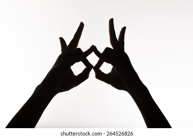 Hands Of A Woman Practicing Maha Sakal Mudra.