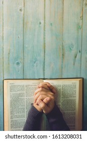 Hands Woman Pray On Open Bible,prayer And Worship In The Morning With Copy Space.