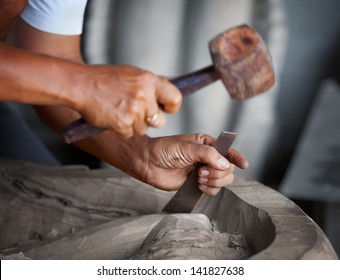 Hands woodcarver while working with the tools - Powered by Shutterstock